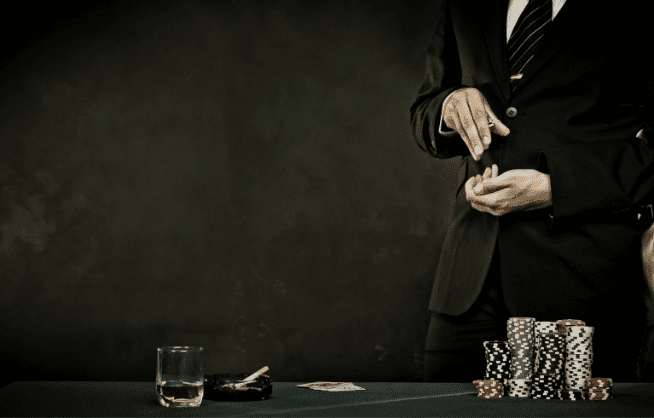 Man holding poker chips in his hands